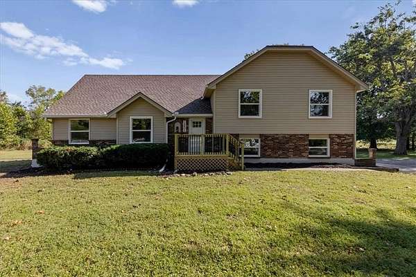 3.72 Acres of Land with Home for Sale in Peculiar, Missouri