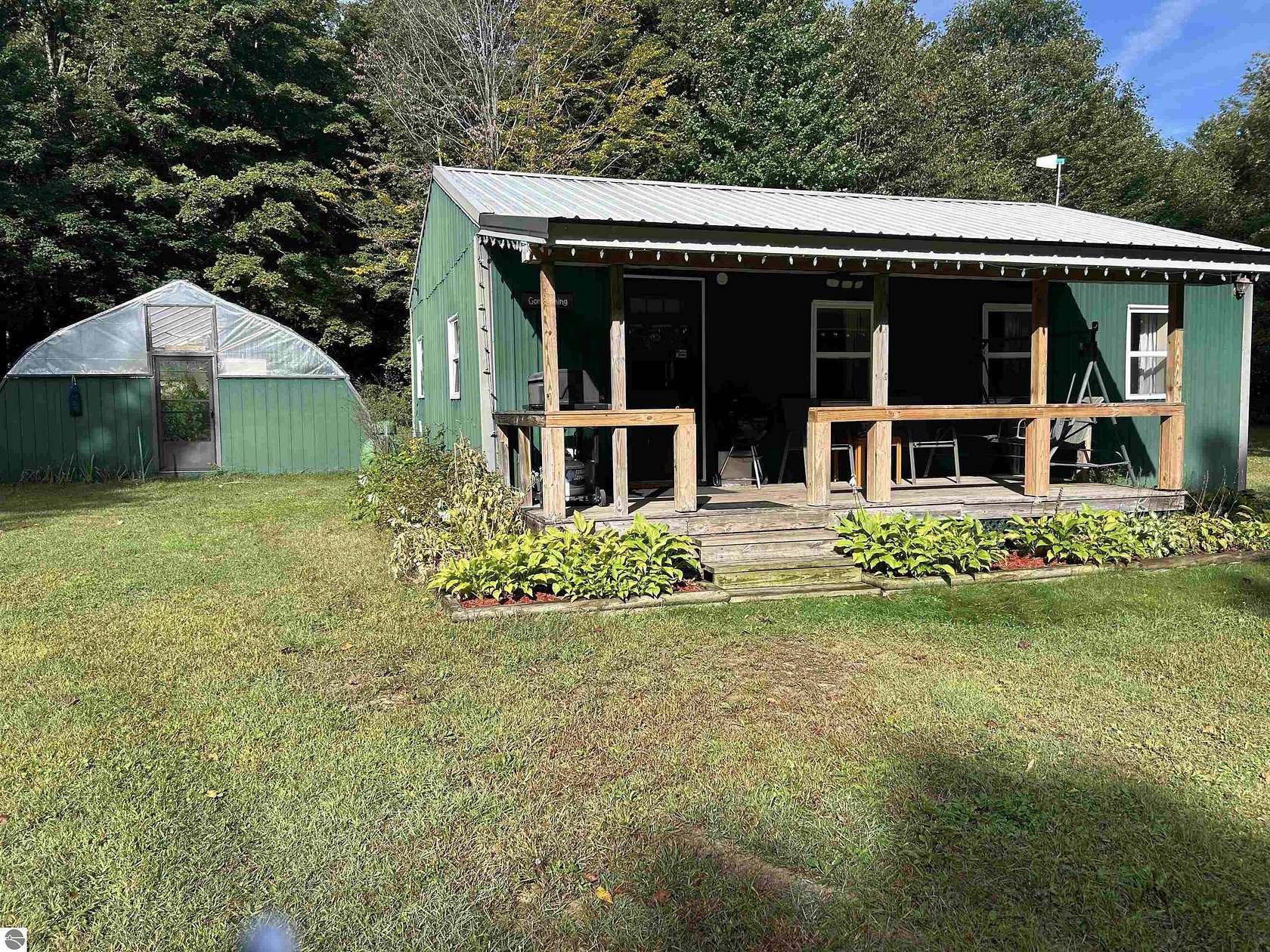 10 Acres of Recreational Land with Home for Sale in Mancelona, Michigan