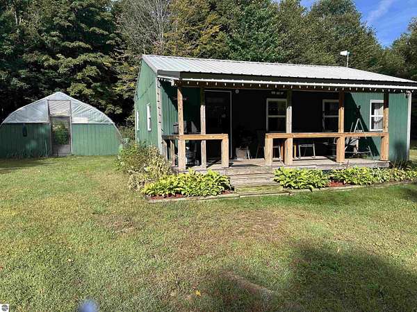10 Acres of Recreational Land with Home for Sale in Mancelona, Michigan