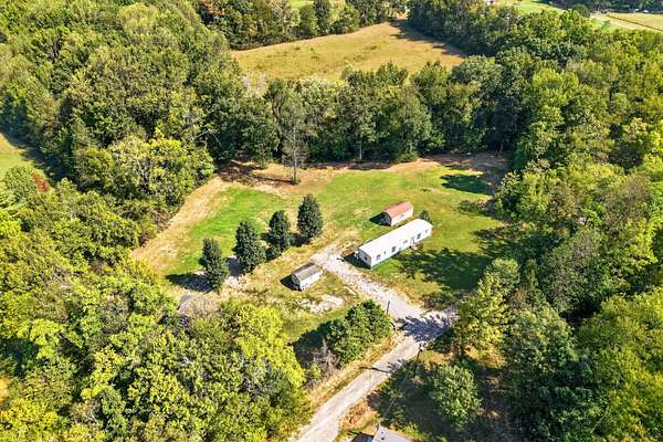 1.73 Acres of Land with Home for Sale in Smithville, Tennessee