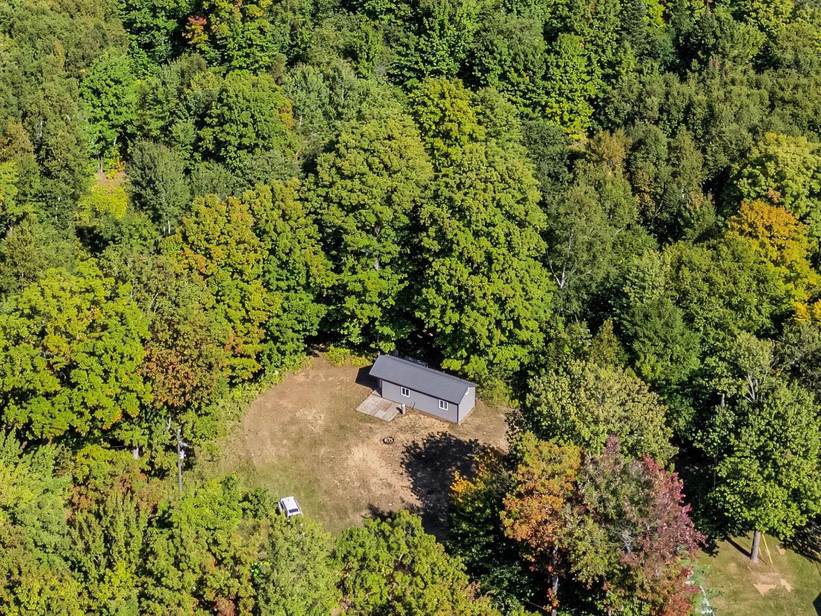 10 Acres of Recreational Land with Home for Sale in Eckerman, Michigan