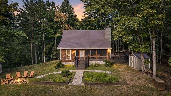 7.62 Acres of Land with Home for Sale in Cherry Log, Georgia