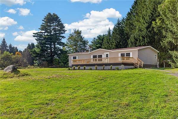 5.59 Acres of Land with Home for Sale in New Berlin, New York