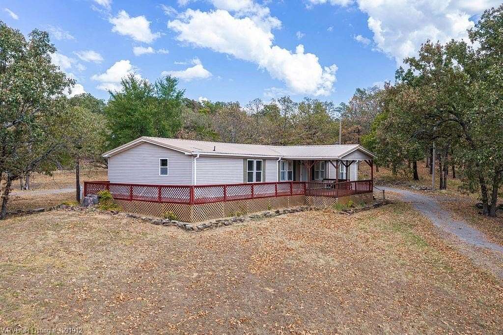 7.65 Acres of Land with Home for Sale in Hackett, Arkansas