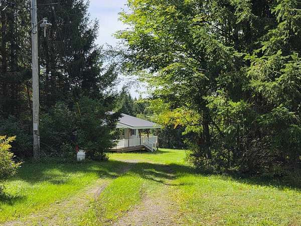 10 Acres of Recreational Land with Home for Sale in Summit, New York