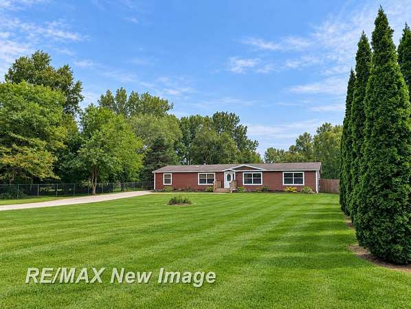 1.5 Acres of Land with Home for Sale in Birch Run, Michigan