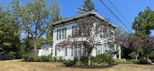 2 Acres of Land with Home for Sale in Cedar Springs, Michigan