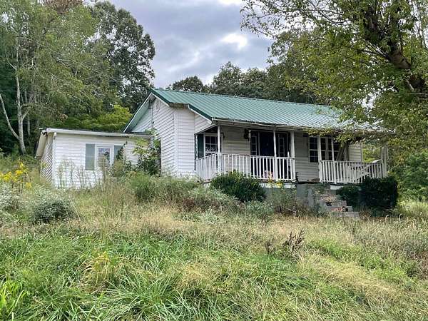 6.9 Acres of Land with Home for Sale in Centertown, Kentucky