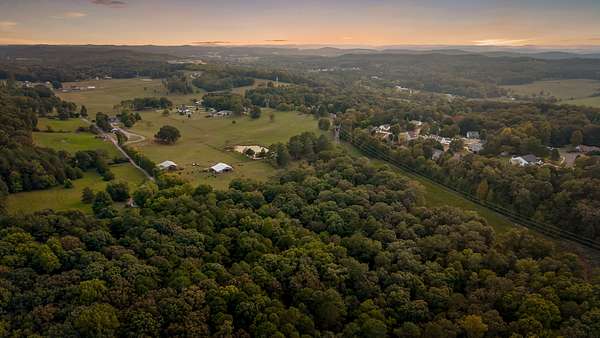 46.7 Acres of Agricultural Land with Home for Sale in Cleveland, Tennessee