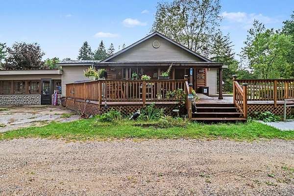 5 Acres of Land with Home for Sale in Bear Lake, Michigan