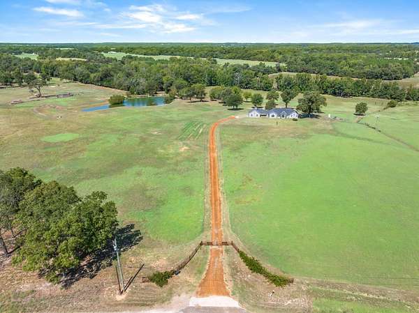 32.9 Acres of Land with Home for Sale in Ben Wheeler, Texas