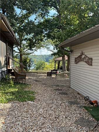 9.9 Acres of Land with Home for Sale in Camdenton, Missouri