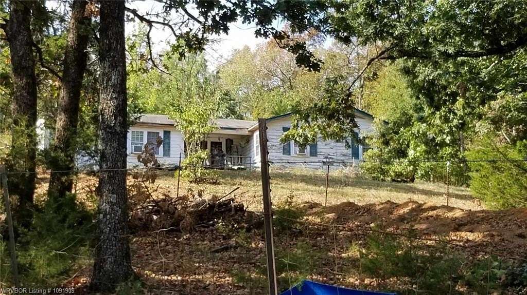 6.85 Acres of Land with Home for Sale in Chester, Arkansas