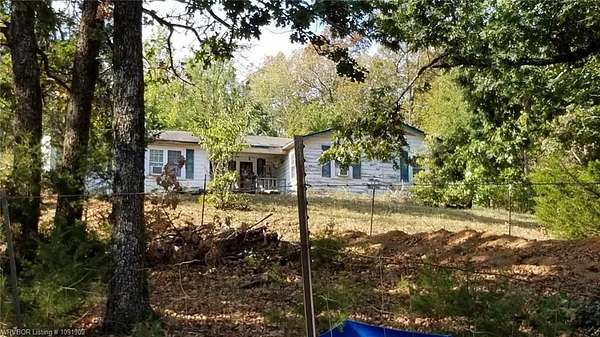 6.85 Acres of Land with Home for Sale in Chester, Arkansas