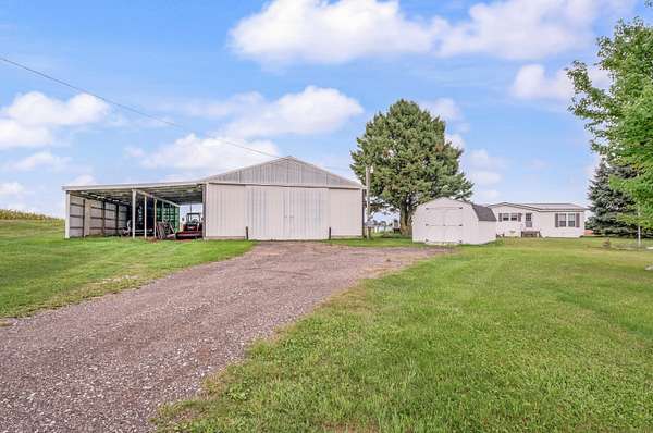 15 Acres of Land with Home for Sale in Howard City, Michigan