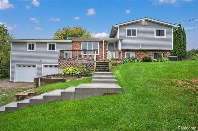 1.57 Acres of Land with Home for Sale in Arcadia Township, Michigan