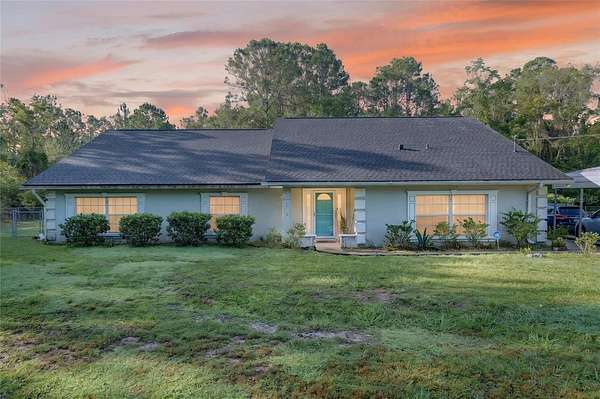 4.27 Acres of Land with Home for Sale in Interlachen, Florida