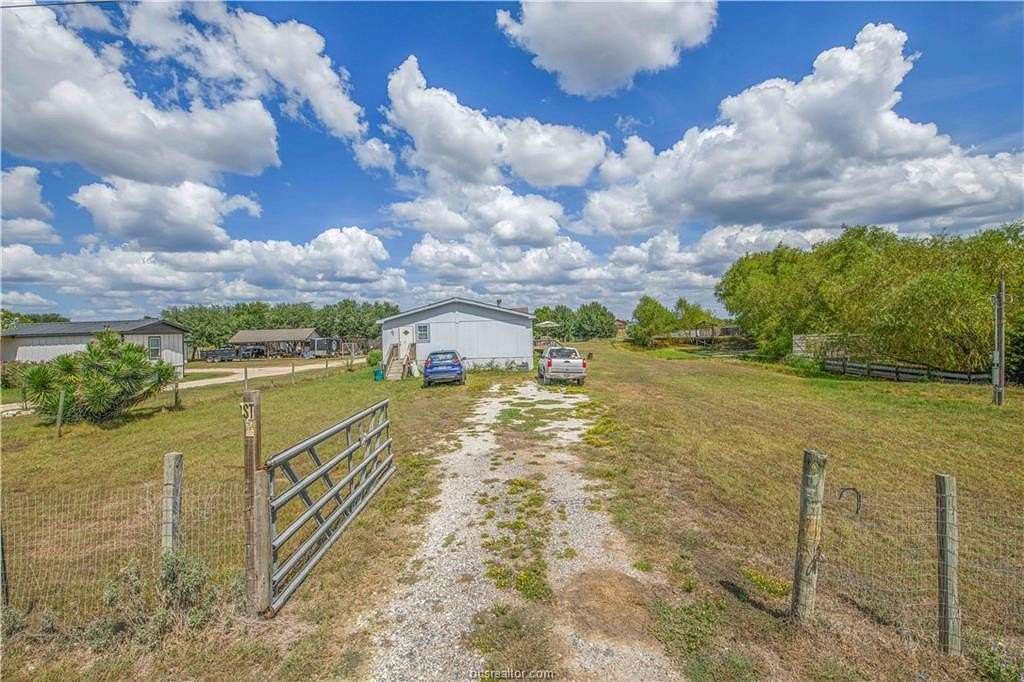 1.63 Acres of Land with Home for Lease in Hearne, Texas