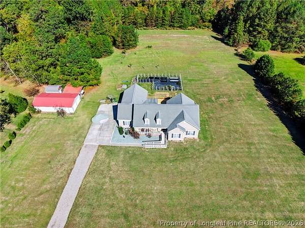 7.66 Acres of Land with Home for Sale in Lillington, North Carolina