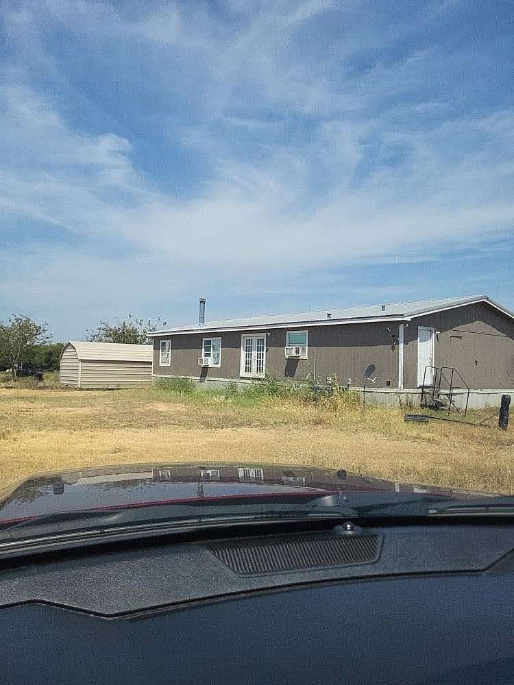 1.58 Acres of Land with Home for Sale in Trenton, Texas