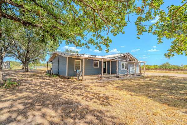10.9 Acres of Land with Home for Sale in Tolar, Texas