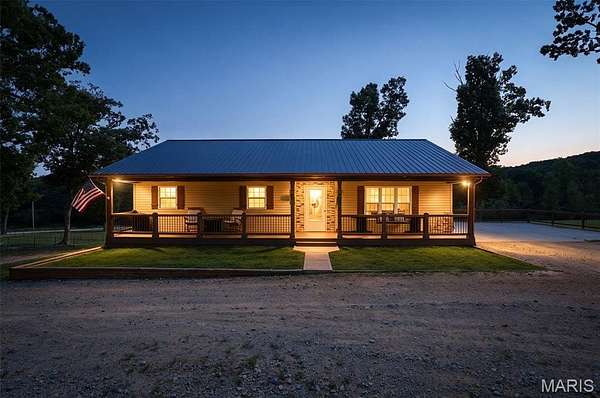 10.3 Acres of Land with Home for Sale in Irondale, Missouri
