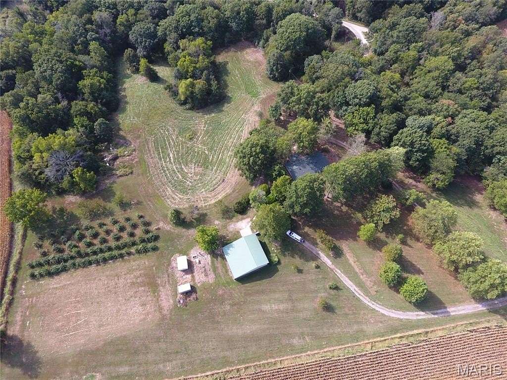 10 Acres of Land with Home for Sale in Jerseyville, Illinois
