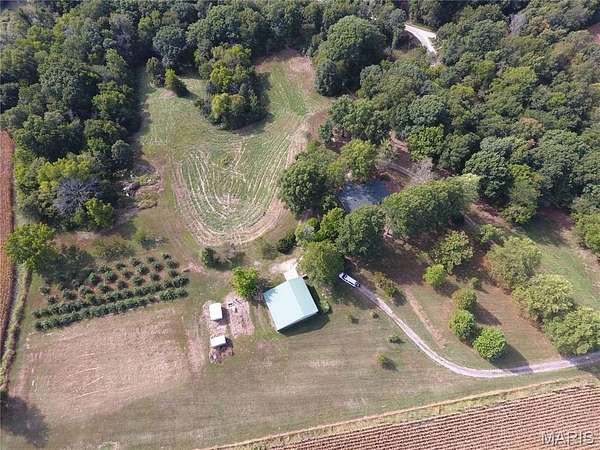 10 Acres of Land with Home for Sale in Jerseyville, Illinois