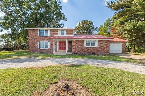 4.5 Acres of Land with Home for Sale in Naylor, Missouri