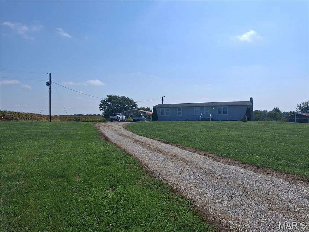 5 Acres of Land with Home for Sale in Paris, Missouri