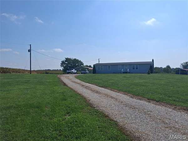 5 Acres of Land with Home for Sale in Paris, Missouri