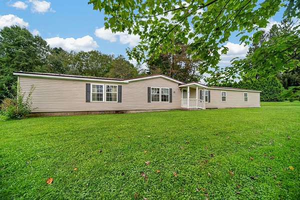 3.45 Acres of Land with Home for Sale in Union City, Pennsylvania