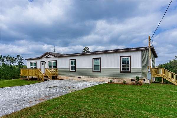 6.24 Acres of Land with Home for Sale in Seale, Alabama