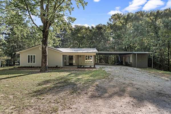 4.64 Acres of Land with Home for Sale in Center, Texas