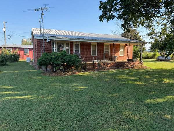 130 Acres of Agricultural Land with Home for Auction in Winchester, Tennessee