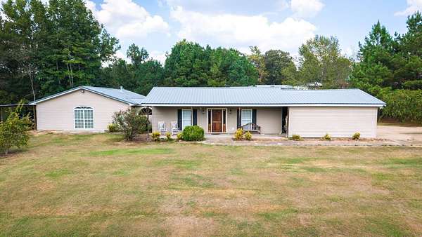 6.68 Acres of Land with Home for Sale in Reform, Alabama