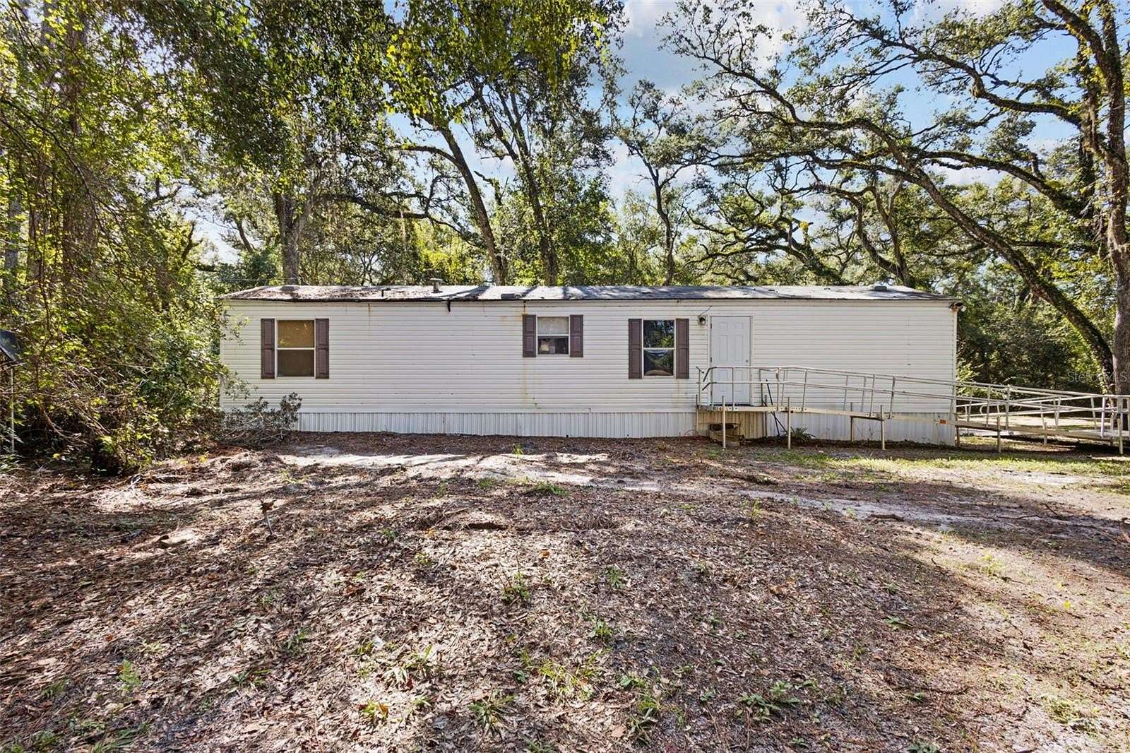 6.75 Acres of Land with Home for Sale in Old Town, Florida