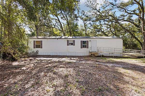 6.75 Acres of Land with Home for Sale in Old Town, Florida