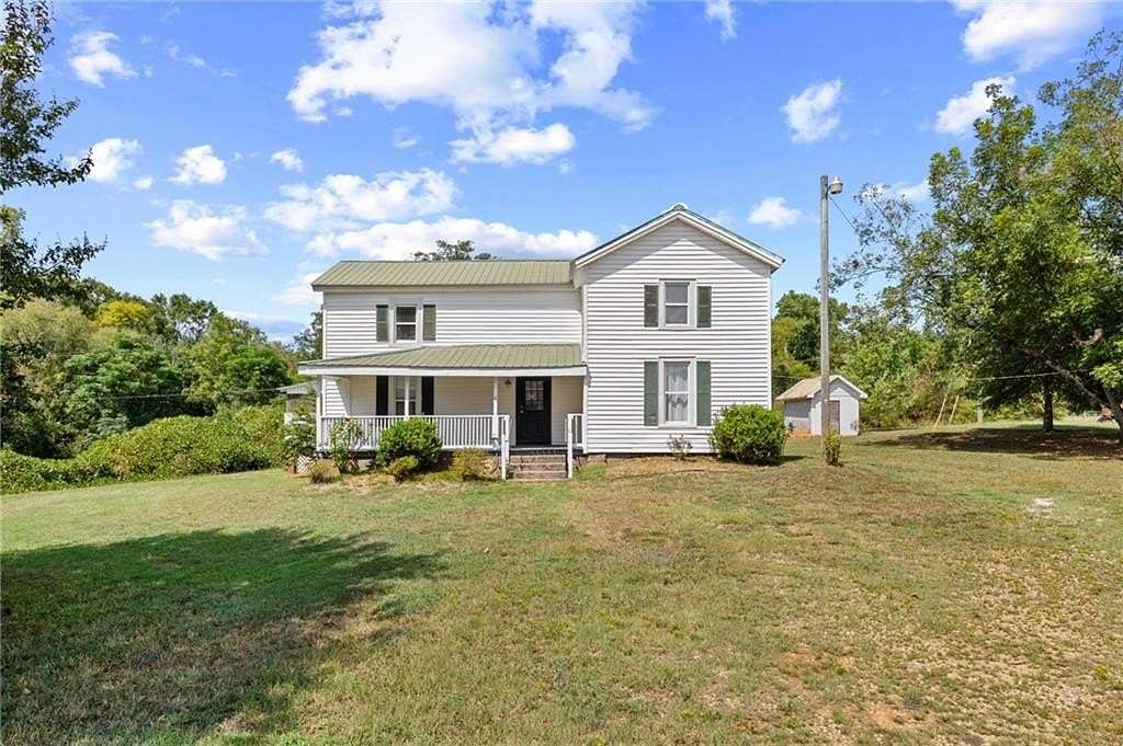 5.1 Acres of Land with Home for Sale in Buckhead, Georgia