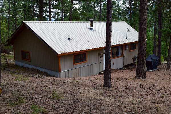 13.3 Acres of Recreational Land with Home for Sale in Alberton, Montana