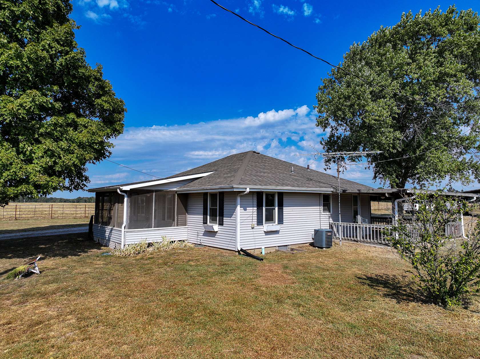 6.4 Acres of Land with Home for Sale in Osceola, Missouri