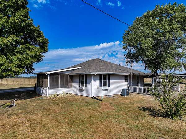 6.4 Acres of Land with Home for Sale in Osceola, Missouri