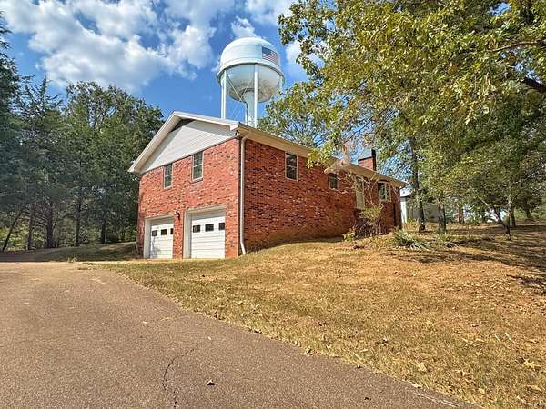 1.88 Acres of Land with Home for Sale in Selmer, Tennessee
