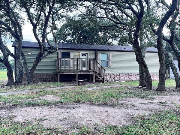 9.19 Acres of Land with Home for Lease in Rockport, Texas