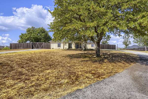 1.5 Acres of Land with Home for Sale in Shady Shores, Texas