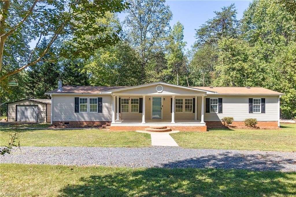 3.17 Acres of Land with Home for Sale in Stokesdale, North Carolina