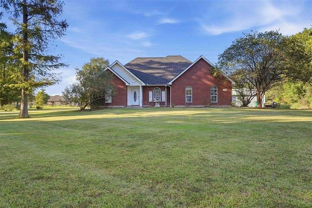 1.77 Acres of Land with Home for Sale in Moss Bluff, Louisiana