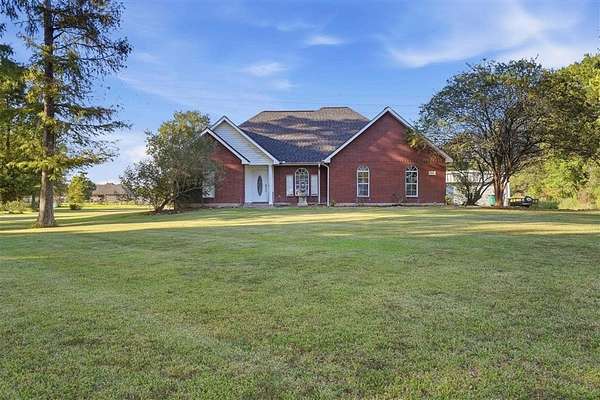 1.77 Acres of Land with Home for Sale in Moss Bluff, Louisiana