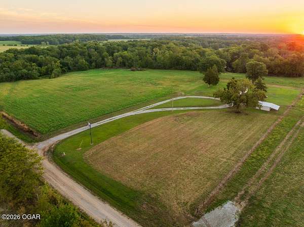 52 Acres of Land with Home for Sale in Rich Hill, Missouri