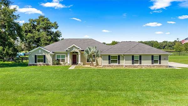 11.4 Acres of Land with Home for Sale in Morriston, Florida